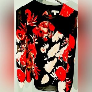 Eva Mendes Small long sleeve blouse, sheer with a liner in the main portion